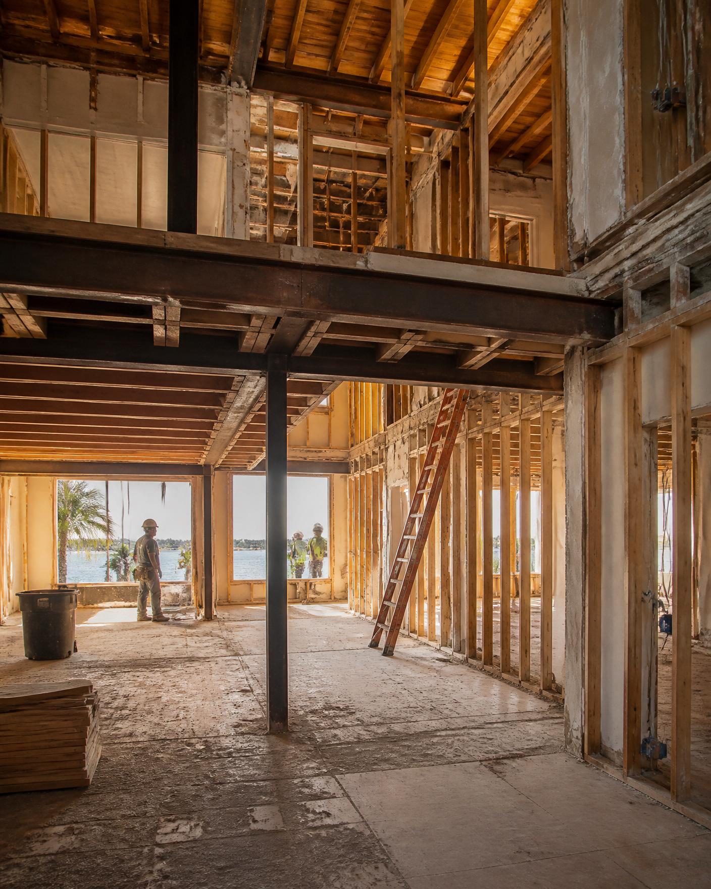 Complex renovation project with exposed framing and structural work